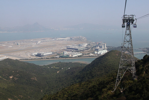 Rising to the top of Lantau Island, Hong Kong airport down below