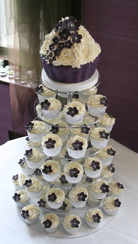 Dark purple wedding cupcake tower All vanilla giant cupcake with matching 