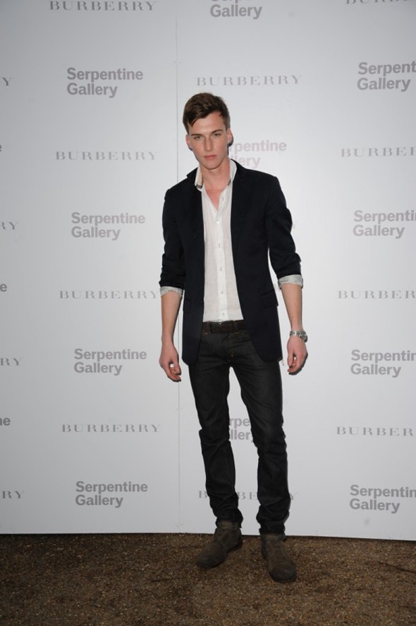 Burberry ad campaign model Johnny George attending the Burberry Serpentine Party