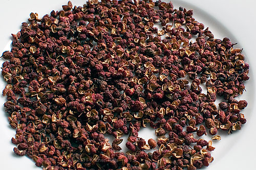 Sichuan Peppercorns on a plate, closeup
