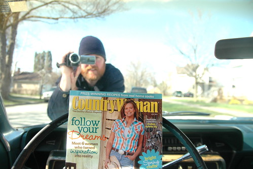 cruisin' in the galaxie while readin' country woman and being filmed.
