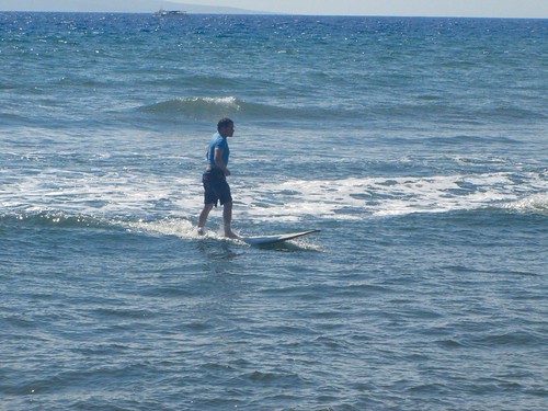 joshy standing on a wave