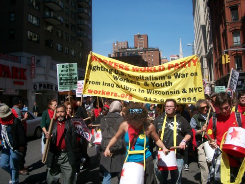 Marchers move down Broadway to Foley Square in the national anti-war demonstration on April 9, 2011. The march oppose all war led by US imperialism around the world. (Photo: Abayomi Azikiwe) by Pan-African News Wire File Photos