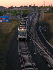 A southbound train approaches the Market St bridge