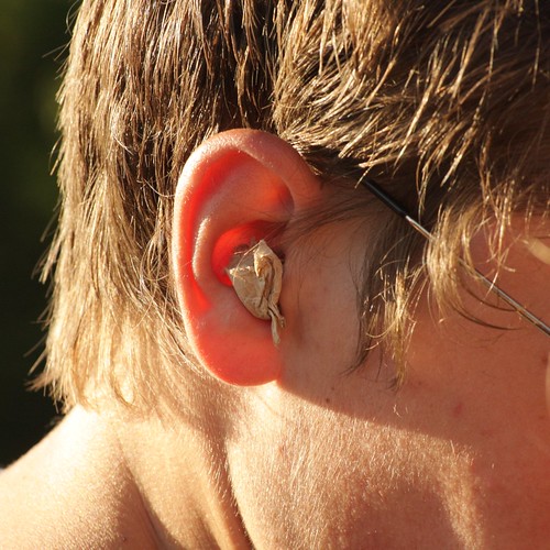 Ear(Plug). by BlacKie-Pix