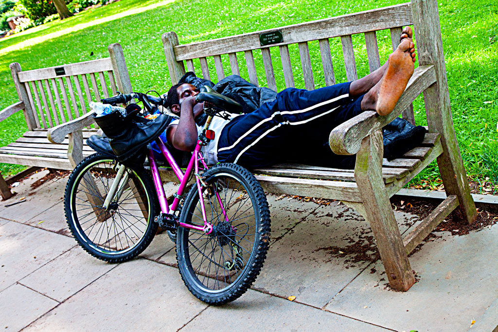 Man-on-bench-with-bike--Washington-Square