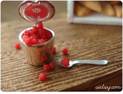 Tin can of miniature raspberries