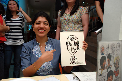 Caricature live sketching for BAT White Christmas Party 2010 - 22