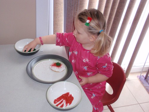 12.12.10 Libby decorating cookies