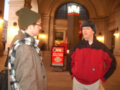 Thomas Nephew speaks to a passerby in a DC Metro station