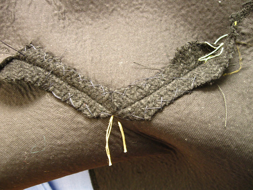 Coat collar inside collar catch stitched