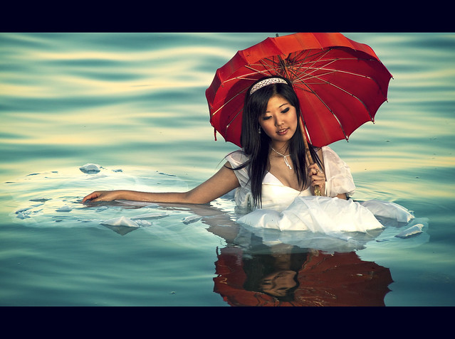 Floating Girl with Red Umbrella