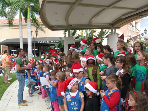 Girl Scouts sing and donate toys in Ft Myers