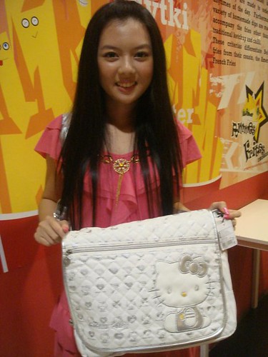 Chee Li Kee with Hello Kitty bag
