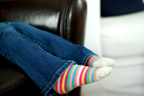 Relaxing in stripey socks.
