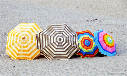 beach umbrellas by Alida's Photos