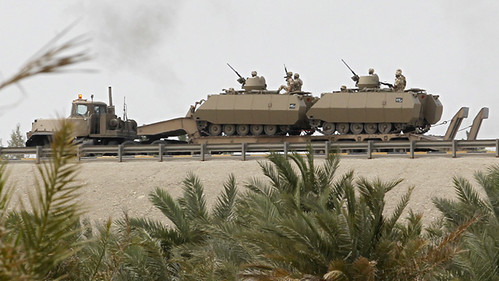 Tanks from the U.S.-backed monarchy in Saudi Arabia crossing over into Bahrain to assist in the suppression of mass demonstrations for reforms. The imperialists have not waged a campaign against the monarchy but have sought regime-change in Libya. by Pan-African News Wire File Photos