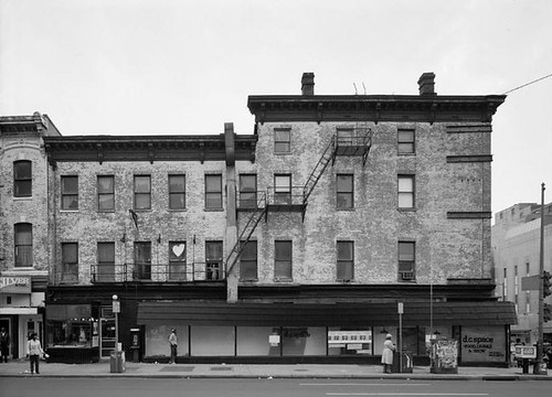 a building on 7th St in the 1970s (by: Anice Hoachlander for the Historic American Buildings Survey, public domain)