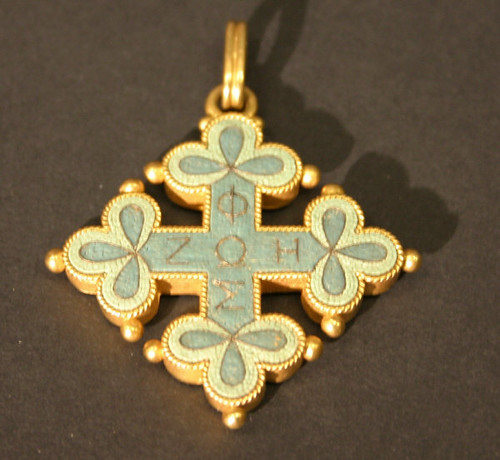 An unusual gold pendant with Greek lettering decoration from the mid-19th Century, which made £5,600