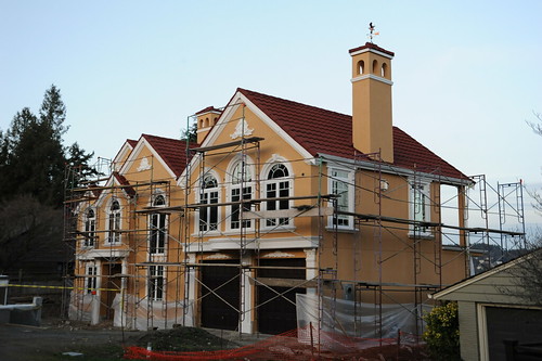 dormer window construction. with romantic florishes and details, curved windows, dormers, eagle wind