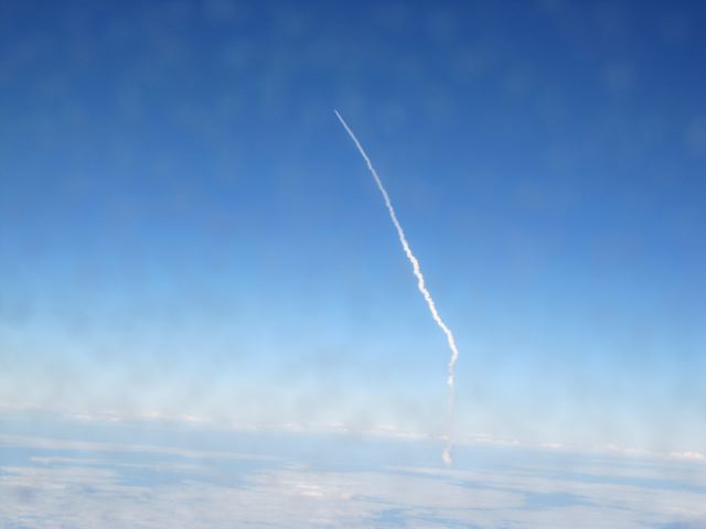 My mom saw the Space Shuttle launch from a JetBlue flight about to land in Florida. What are the odds?!