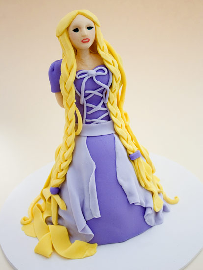 Yesterday Lily's tiger cake was featured Today it's Audrey's Tangled cake
