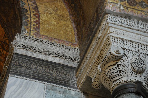 Carved capital and moulding with mosaic above