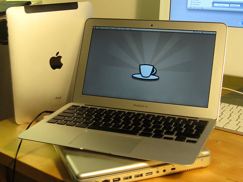 11 inch Macbook air, on top of 12 inch Powerbook and with a first generation Ipad on the side.