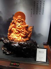 coral gemstone buddha carving