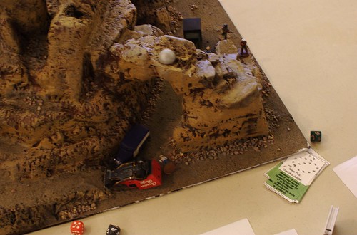 The White Russians spectacularly crash their vehicle as they race up the mesa in part two.