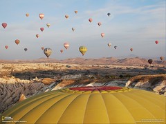 At sunrise the balloons take flight over the Cappodocian moonscape (National Geographic, Contest 2009)
