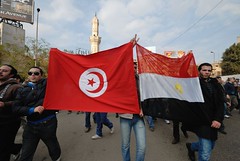 25 January: The Tunisian and Egyptian flag held aloft