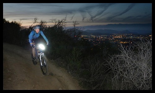 By time we started heading down the mountain, it was time to kick on the lights. The scenery is absolutely amazing at dusk. This is the loop I used to ride after work, by myself, and it was such a nice treat to be able to share it with Donna - I'm looking by BroAndDonna