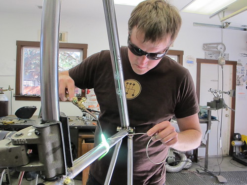 Chris silver brazing his water bottle bosses in. by retrotec&ingliscycles