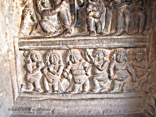Below Vishnu trivikrama A band wearing headgear of english judges cave 2