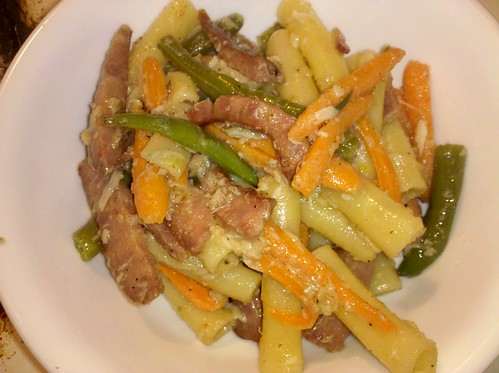 Pasta with sausage, carrots, and green beans tossed in a bagna cauda