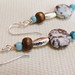 http://www.etsy.com/listing/71775249/beachy-sterling-silver-turquoise-dangle?ref=v1_other_1