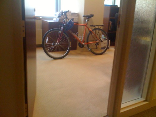 Bike parked in a spare office