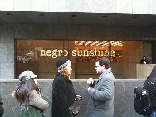 Outside the Whitney Museum (Glenn Ligon neon sign in window)