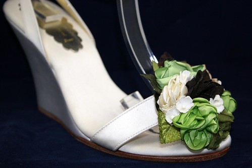 These custom designed wedding wedges are custom designed in ivory satin with