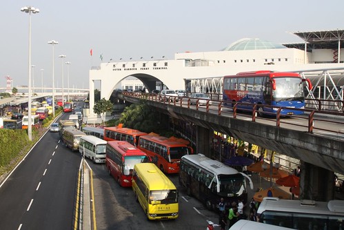 Traffic jam made up of casino shuttle buses, outside the Macau ferry terminal