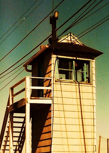 The old steam era crossing gate operator's tower on West 51st Street, at the Grand Trunk Western Railroad Elsdon Yard. ( Gone.) Chicago Illinois USA. October 1983. by Eddie from Chicago