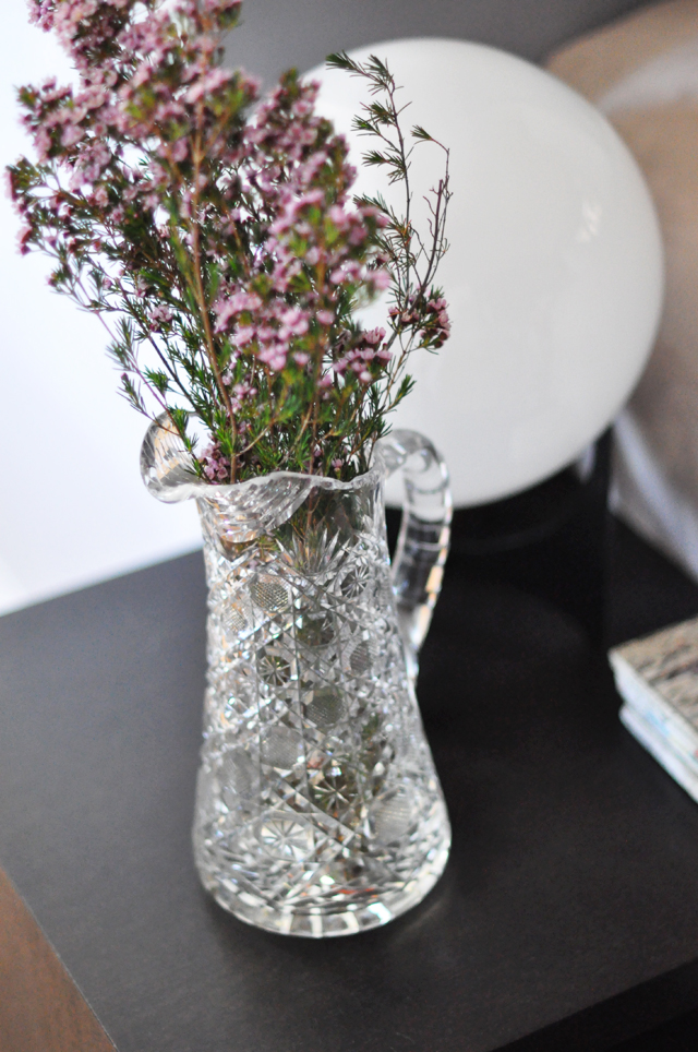 purple flowers in vintage crystal pitcher