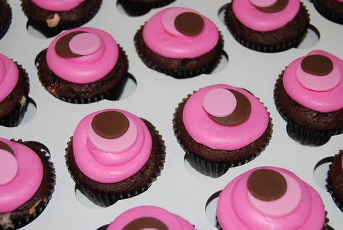 pink and brown sassy circle cucpakes for monkey baby shower cupcake tower