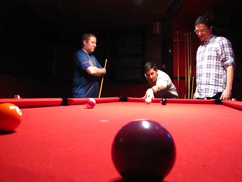 The guys playing pool