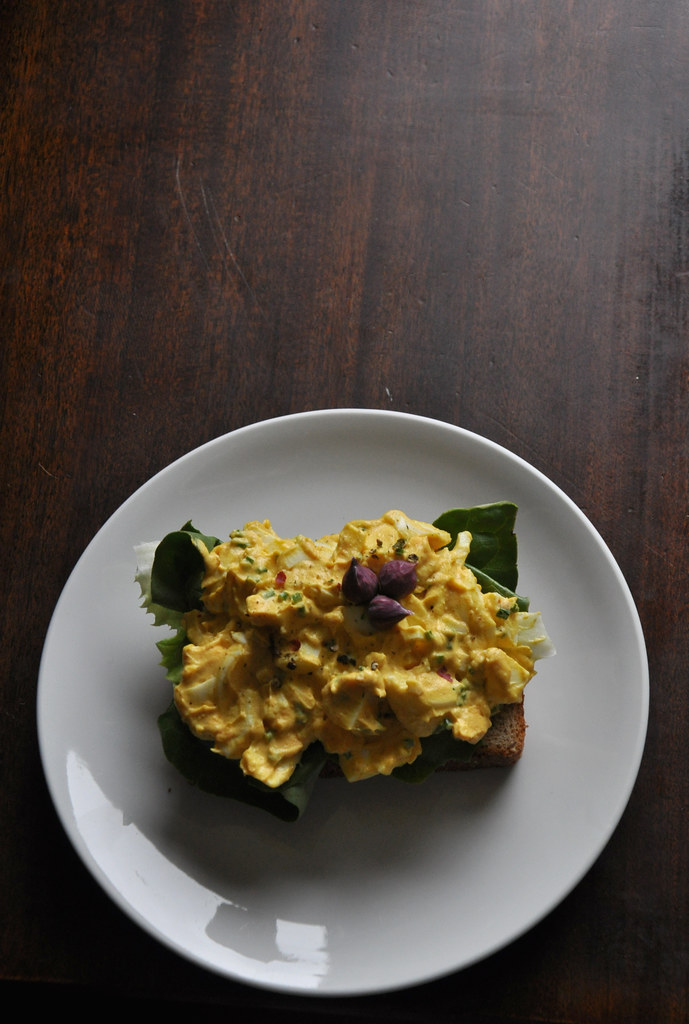 curried egg salad with chive blossoms