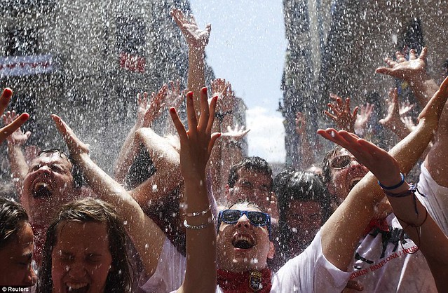 Sun, sangria and a sea of red... as Pamplona prepares for another gorefest at the running of the bulls  5