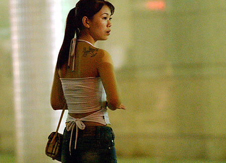 a-prostitute-in-the-street-near-casino-lisboa-china-pic-rex-features-782520992