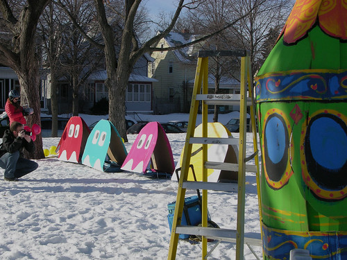pac man and ghosts, and cartoon steam-punk sled 