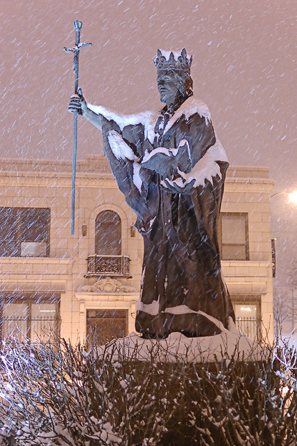 Saint Louis University, in Saint Louis, MIssouri, USA - statue of King Louis IX, at night, in the snow